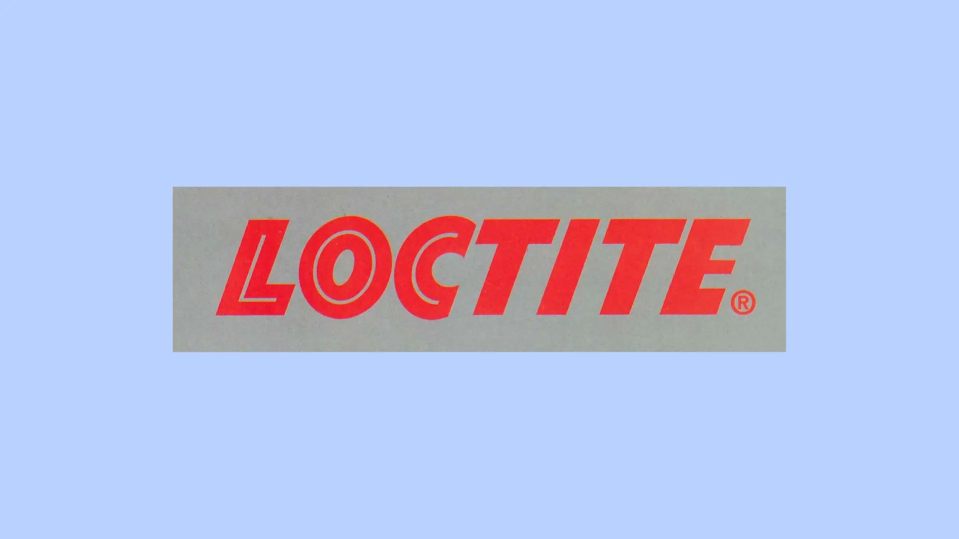 Det röda Loctite-logotypen på grå bakgrund.